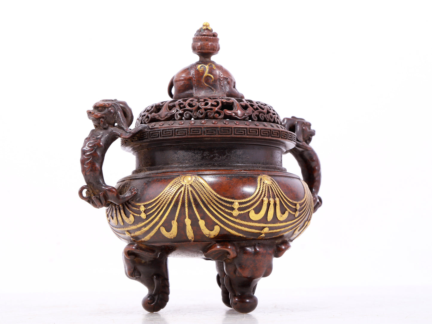 An exquisite gilt bronze elephant-patterned two-eared and tripod censer with lid