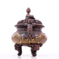 An exquisite gilt bronze elephant-patterned two-eared and tripod censer with lid