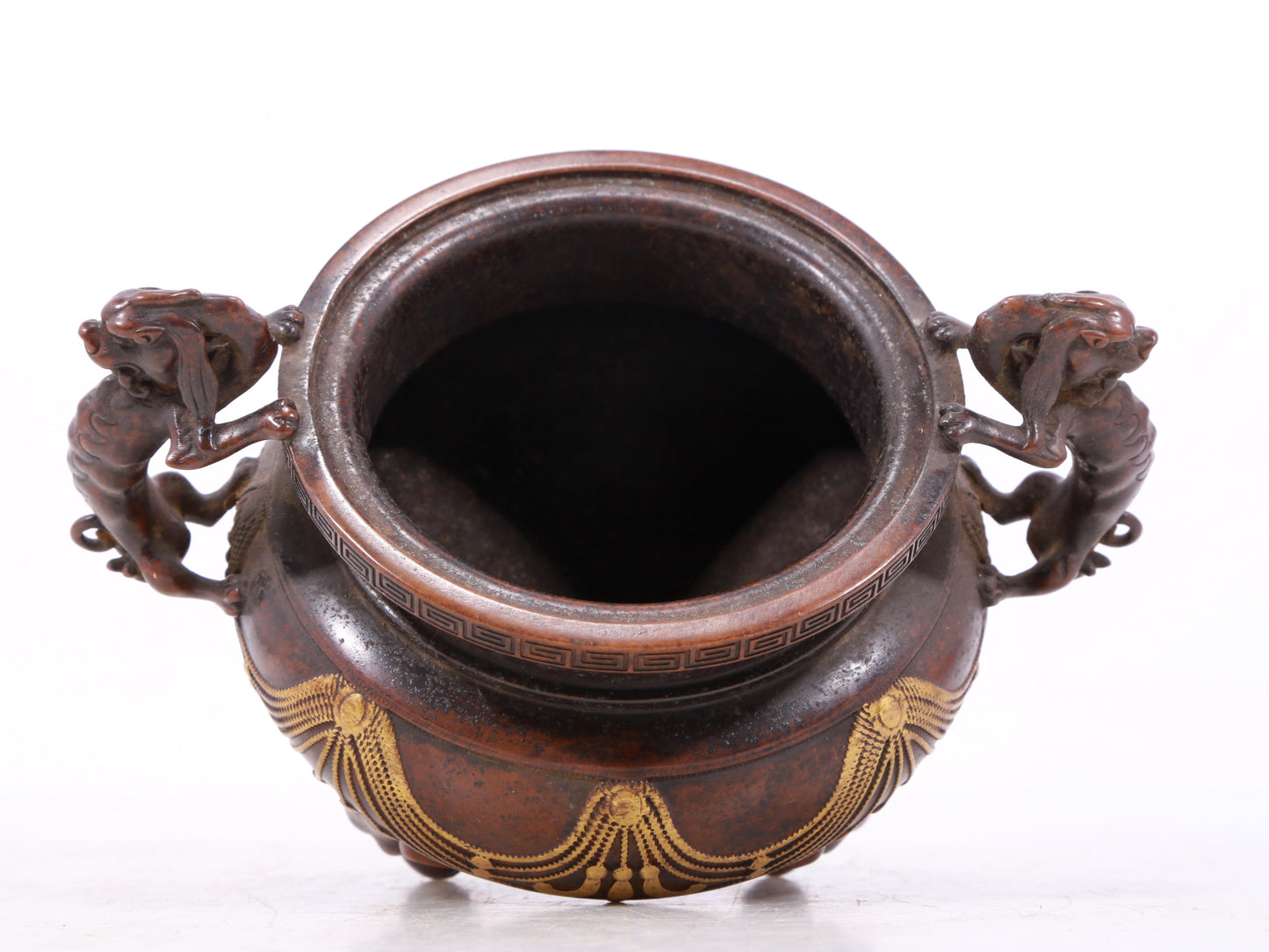 An exquisite gilt bronze elephant-patterned two-eared and tripod censer with lid