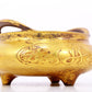 An exquisite gilt bronze Arabic censer with double ears and three legs