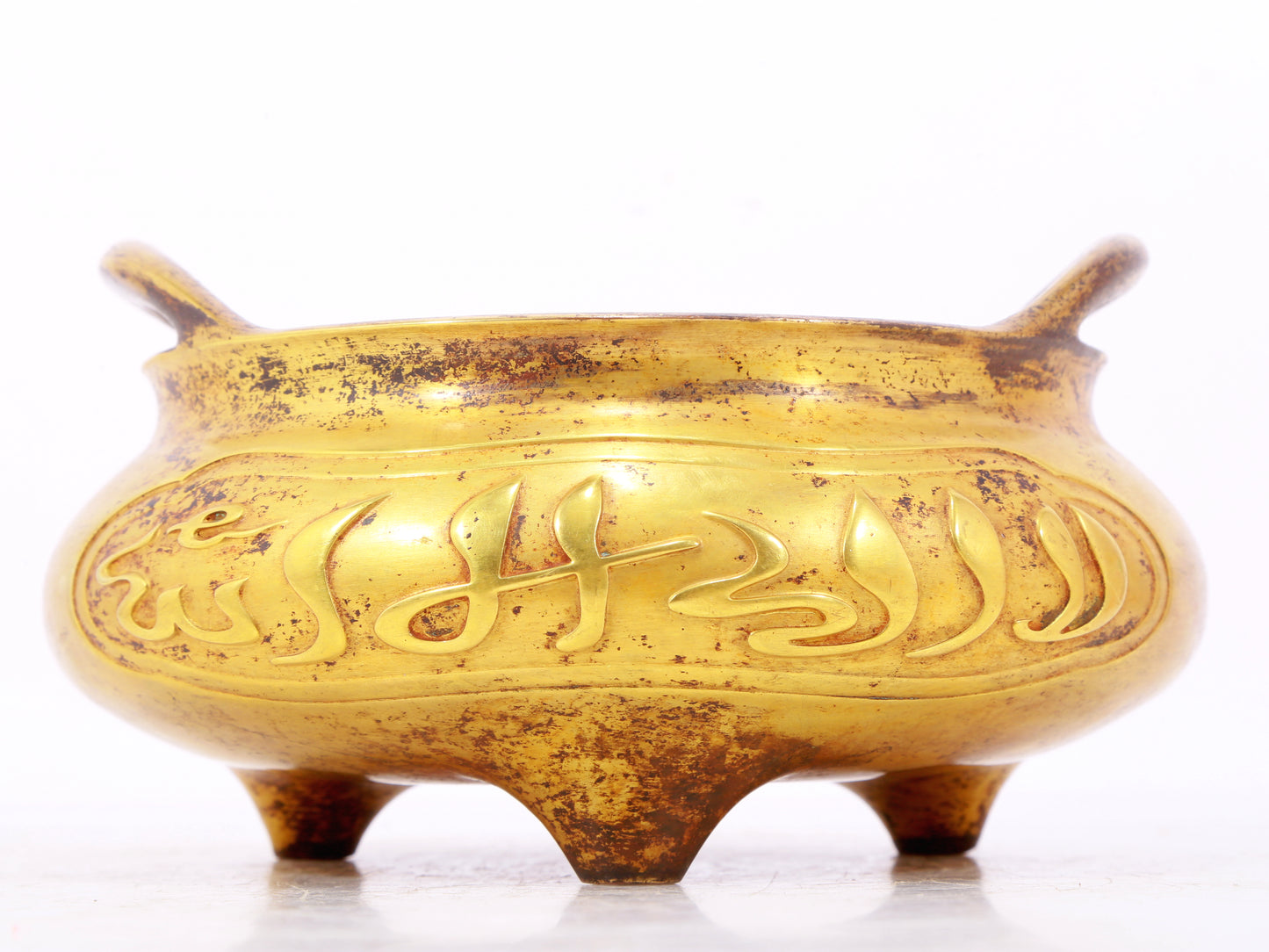 An exquisite gilt bronze Arabic censer with double ears and three legs