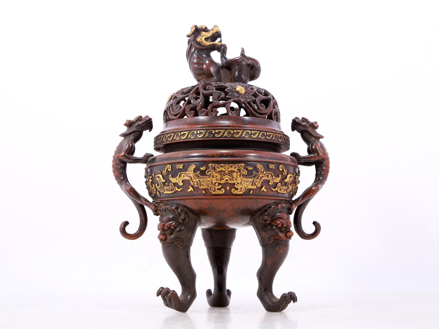 An exquisite gilt bronze double-eared and tripod censer with chilong pattern and lid