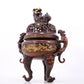 An exquisite gilt bronze double-eared and tripod censer with chilong pattern and lid