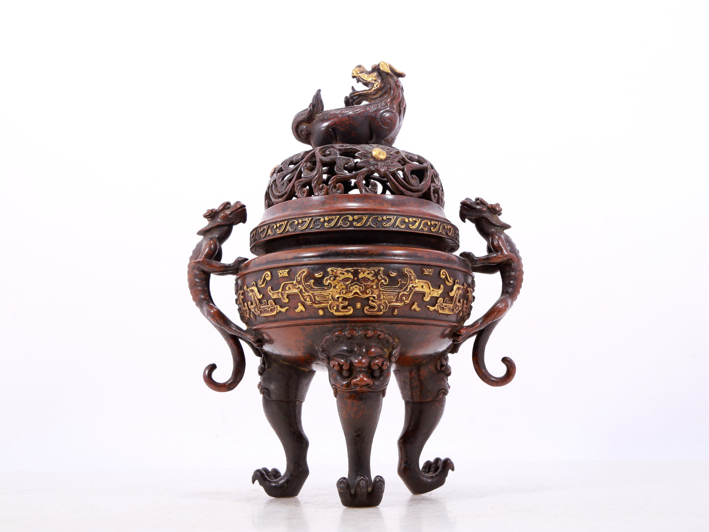 An exquisite gilt bronze double-eared and tripod censer with chilong pattern and lid