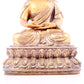 A solemn gilt bronze statue of Sakyamuni