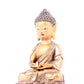 A solemn gilt bronze statue of Sakyamuni