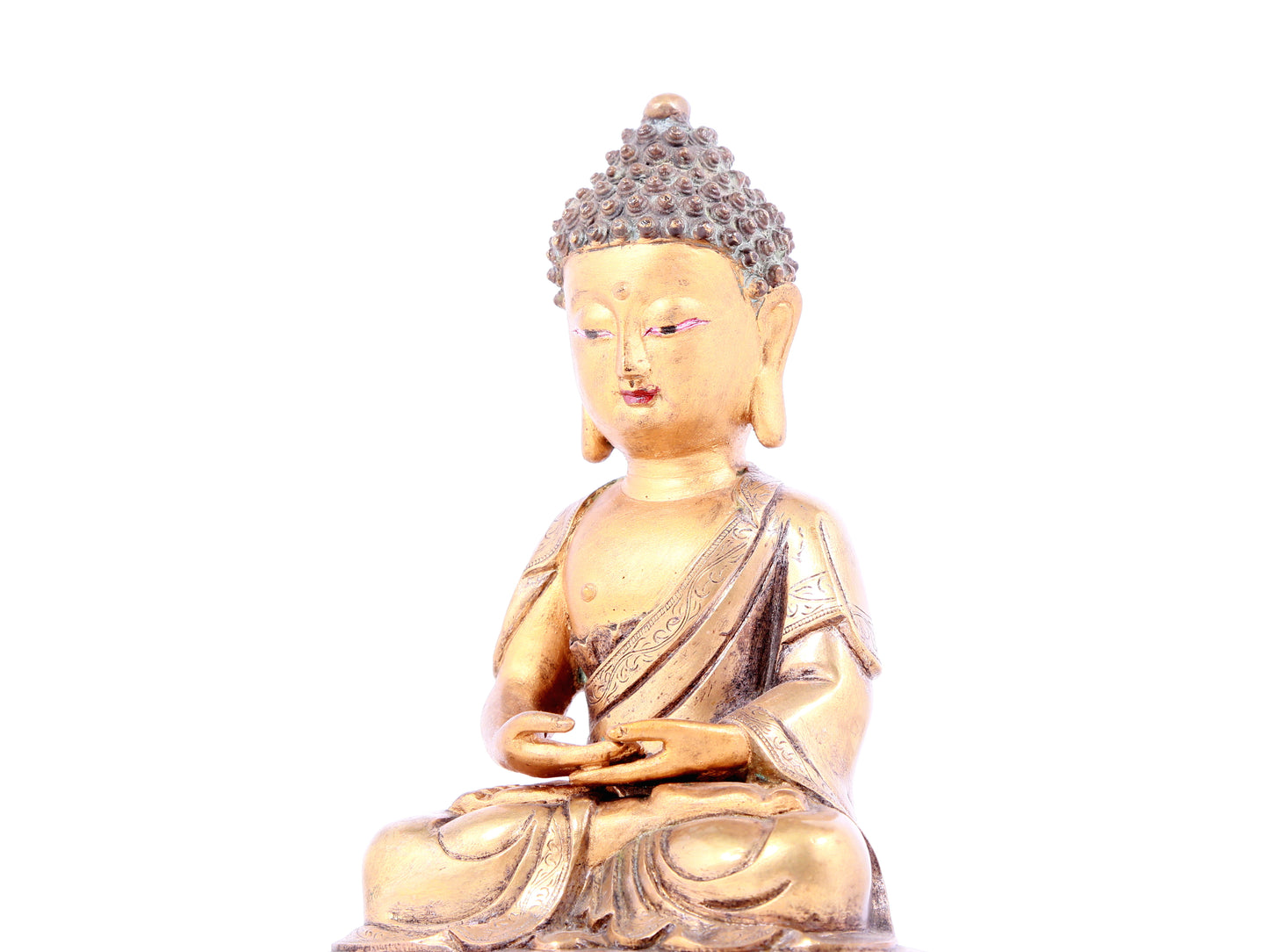 A solemn gilt bronze statue of Sakyamuni