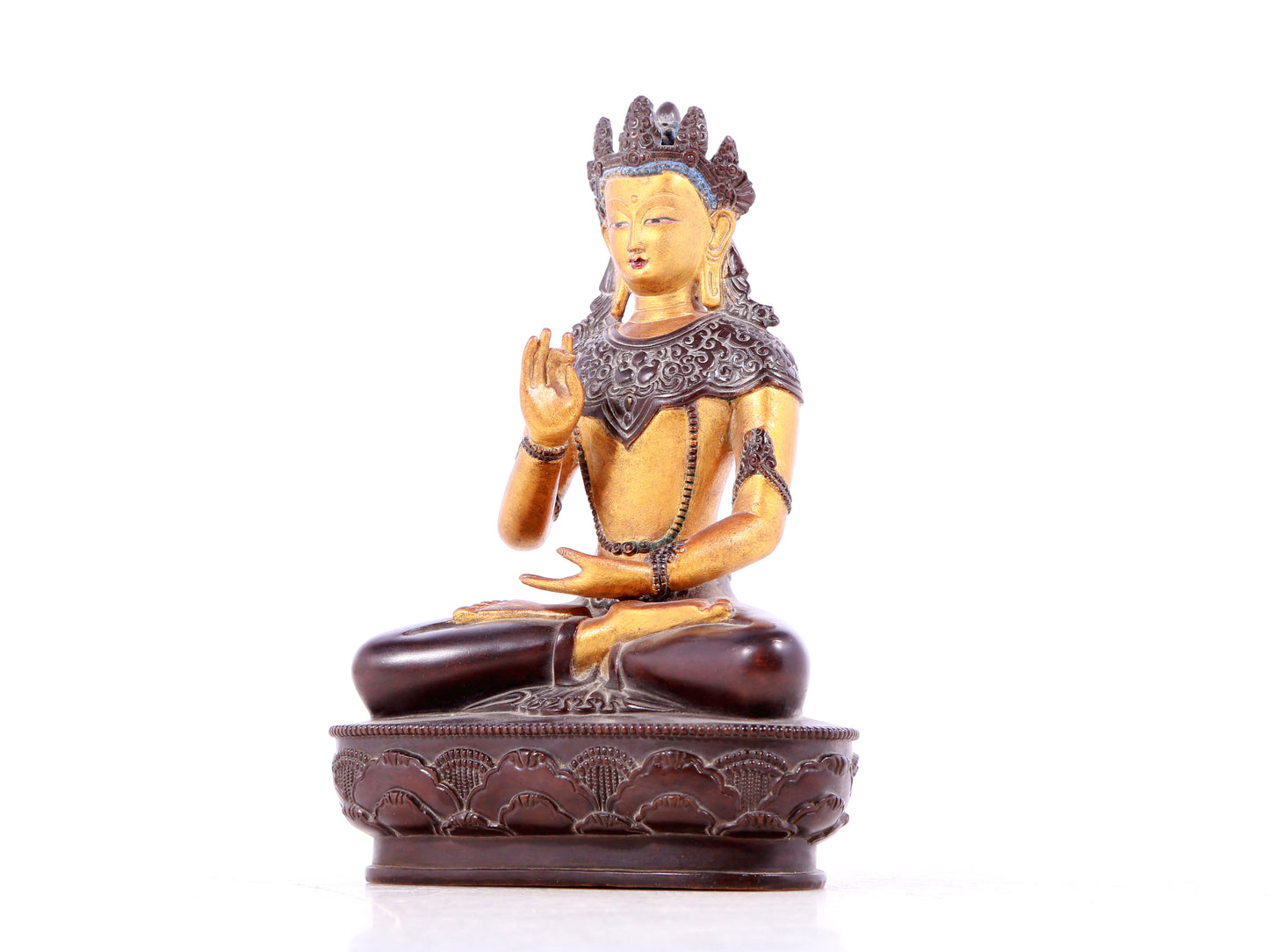 A solemn gilt bronze statue of Bodhisattva