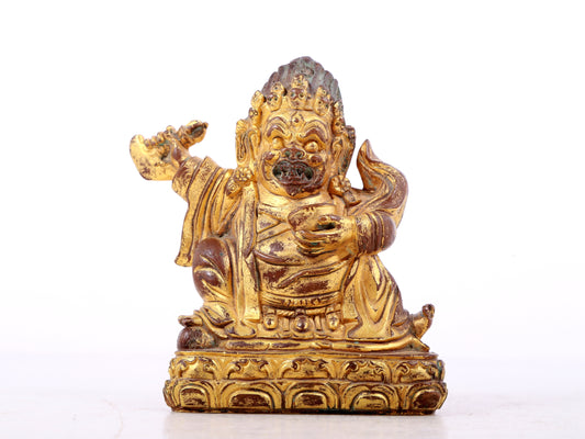 A solemn gilt bronze Vajra statue