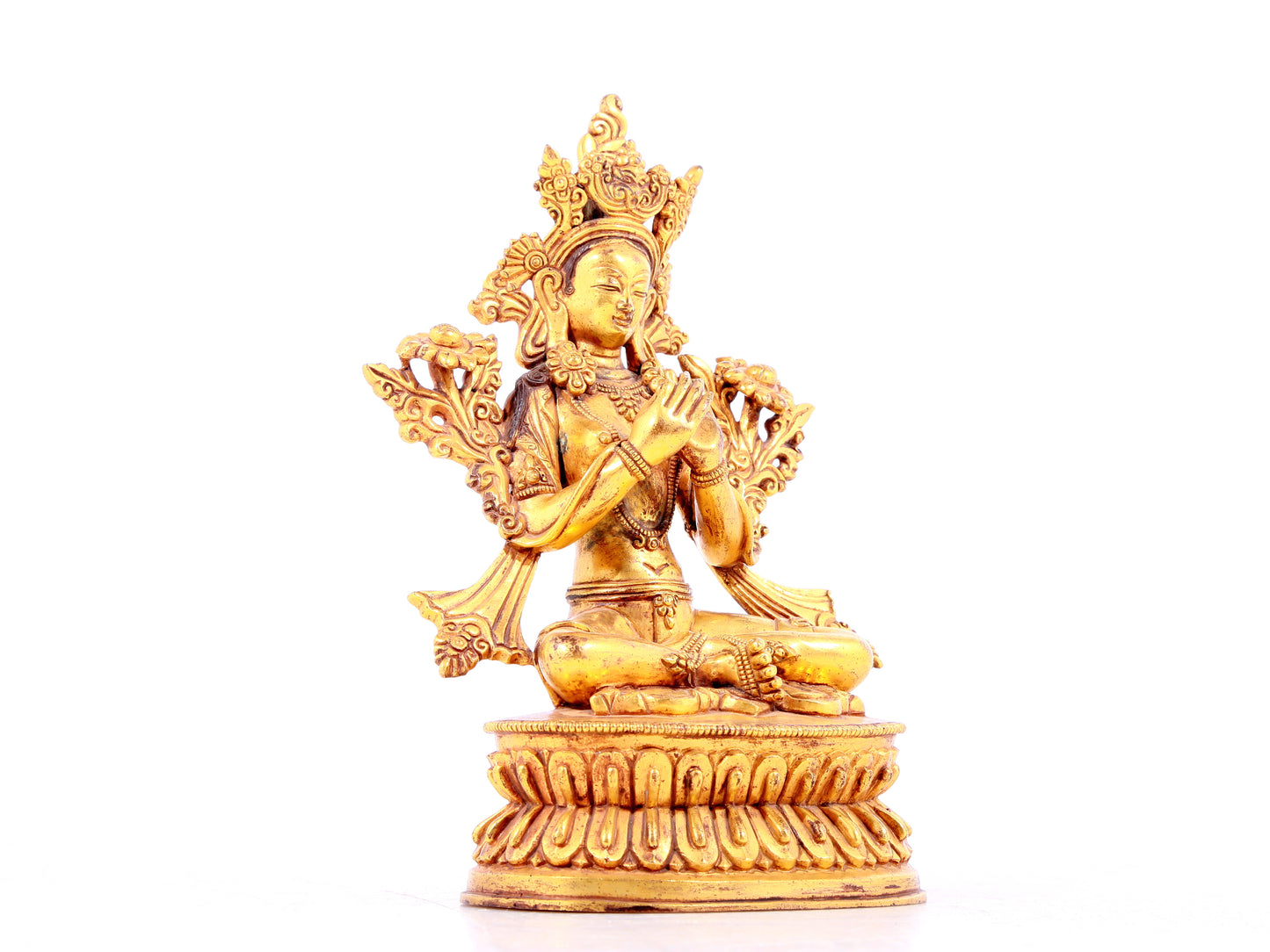 solemn gilt bronze statue of Tara