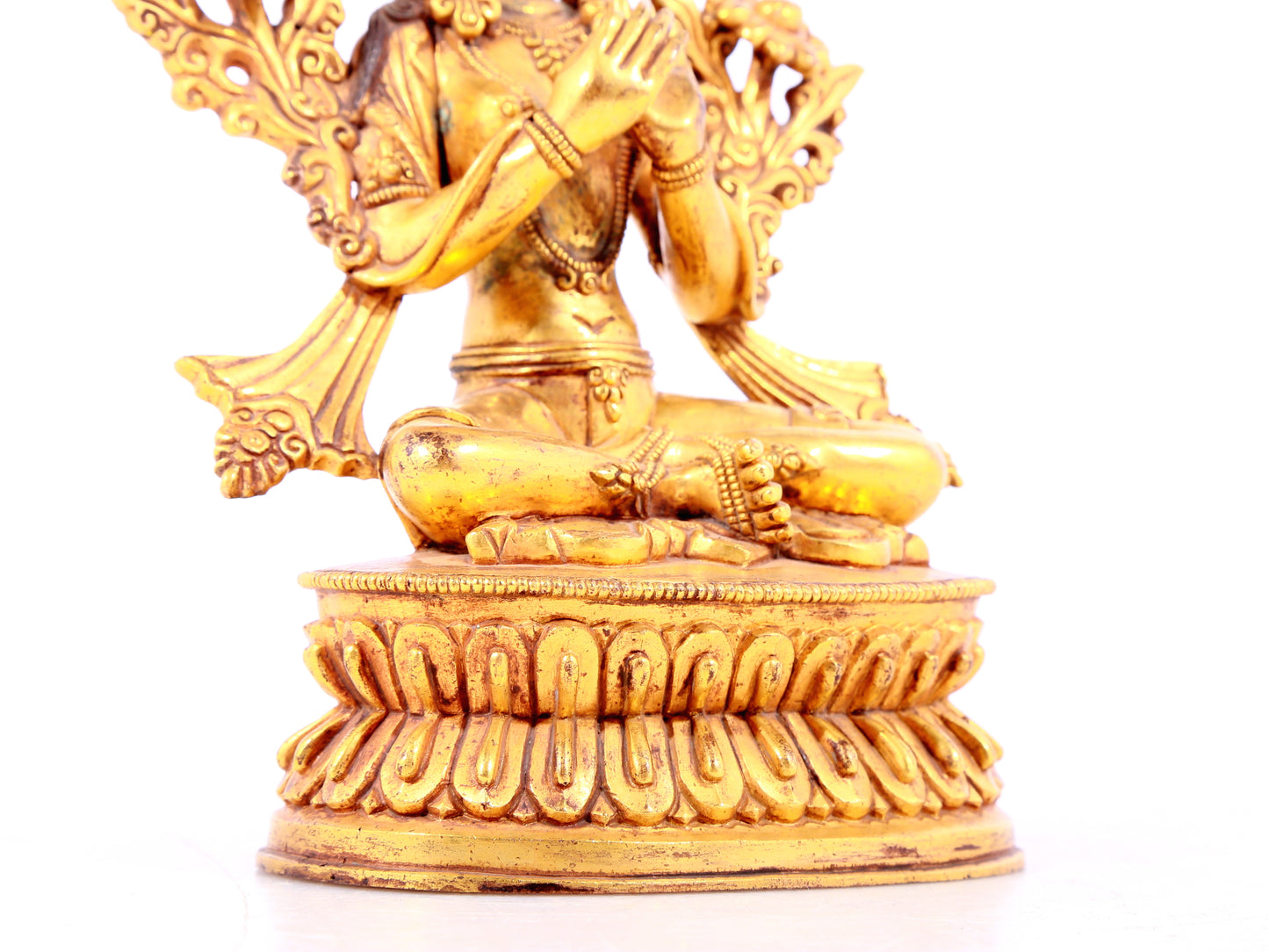 solemn gilt bronze statue of Tara