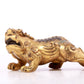 An exquisite gilt copper auspicious animal ornament