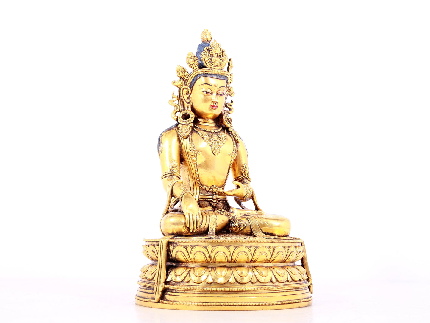 A solemn gilt bronze statue of Bodhisattva