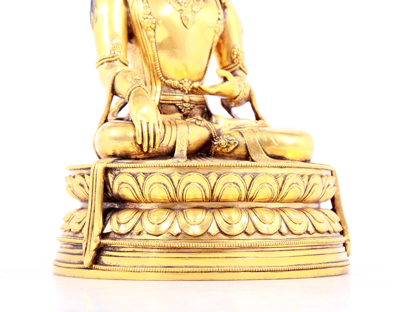 A solemn gilt bronze statue of Bodhisattva