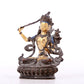 A solemn gilt bronze statue of Manjushri Bodhisattva