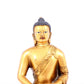 A solemn gilt bronze statue of Sakyamuni