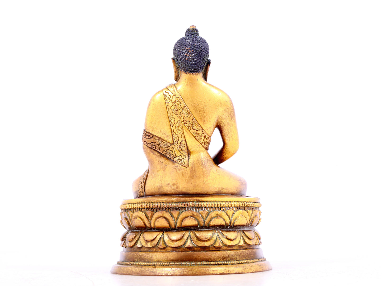 A solemn gilt bronze statue of Sakyamuni