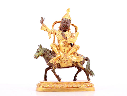 A solemn gilt bronze equestrian Vajra statue