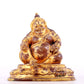 A solemn gilt bronze statue of guru