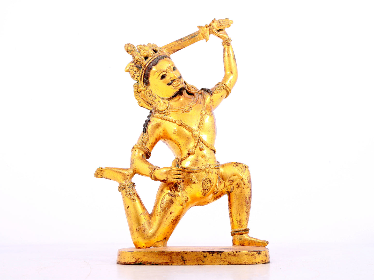 A solemn gilt bronze Vajra statue