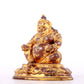 A solemn gilt bronze statue of guru