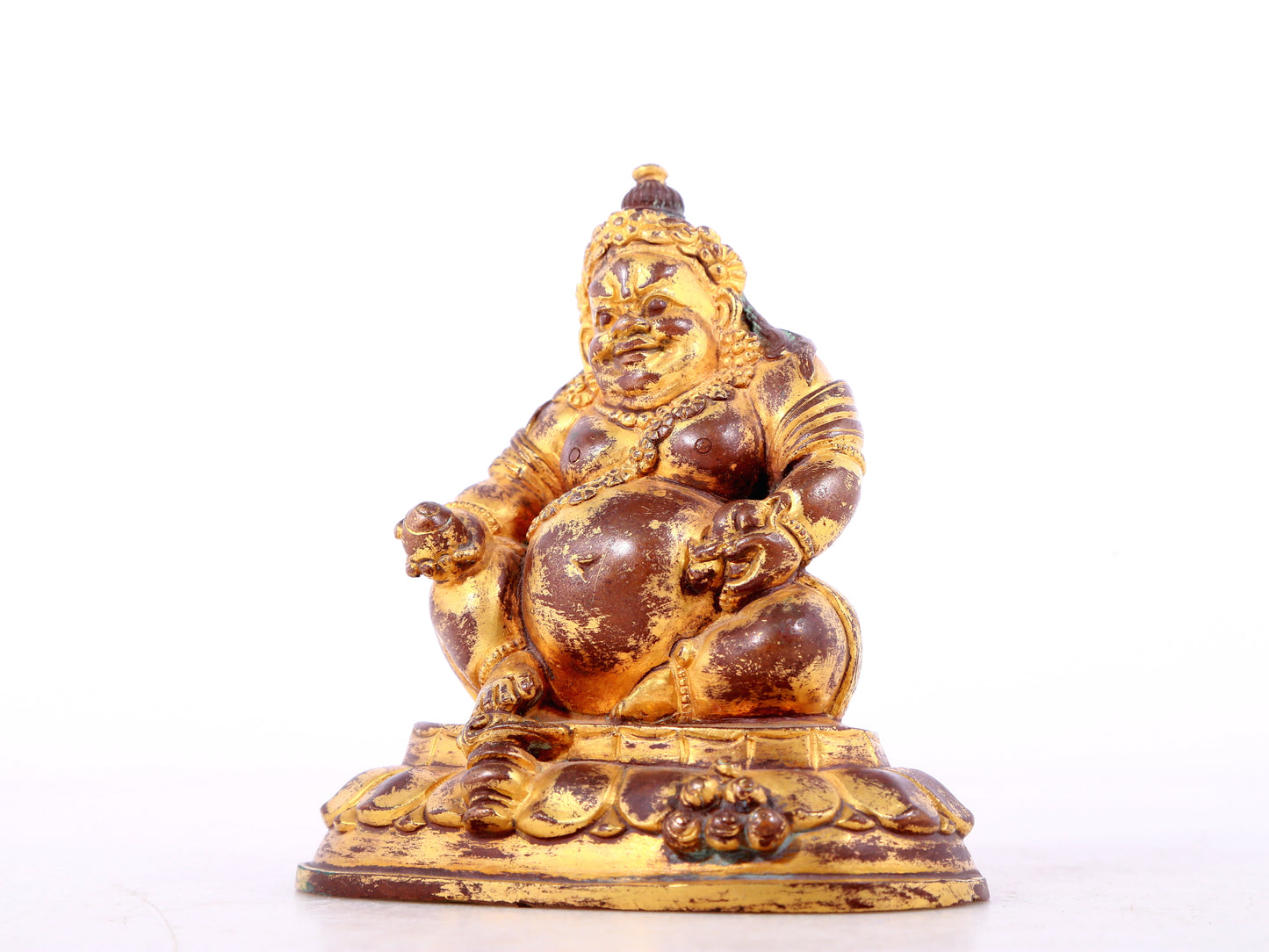 A solemn gilt bronze statue of guru