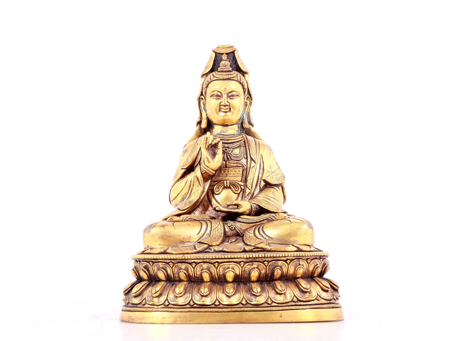 A solemn gilt bronze statue of Guanyin