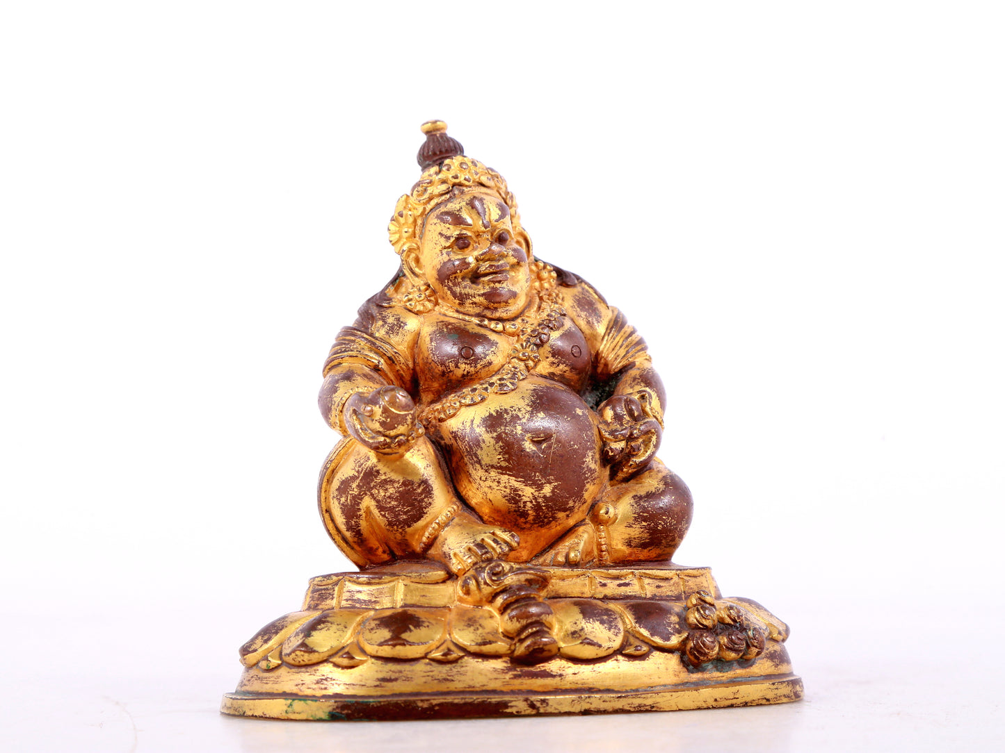 A solemn gilt bronze statue of guru