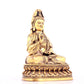 A solemn gilt bronze statue of Guanyin