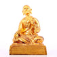 A solemn gilt bronze statue of guru