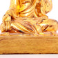 A solemn gilt bronze statue of guru