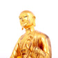 A solemn gilt bronze statue of guru