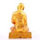 A solemn gilt bronze statue of guru