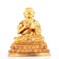 A solemn gilt bronze statue of guru