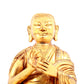 A solemn gilt bronze statue of guru