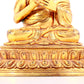 A solemn gilt bronze statue of guru