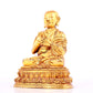 A solemn gilt bronze statue of guru