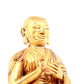 A solemn gilt bronze statue of guru