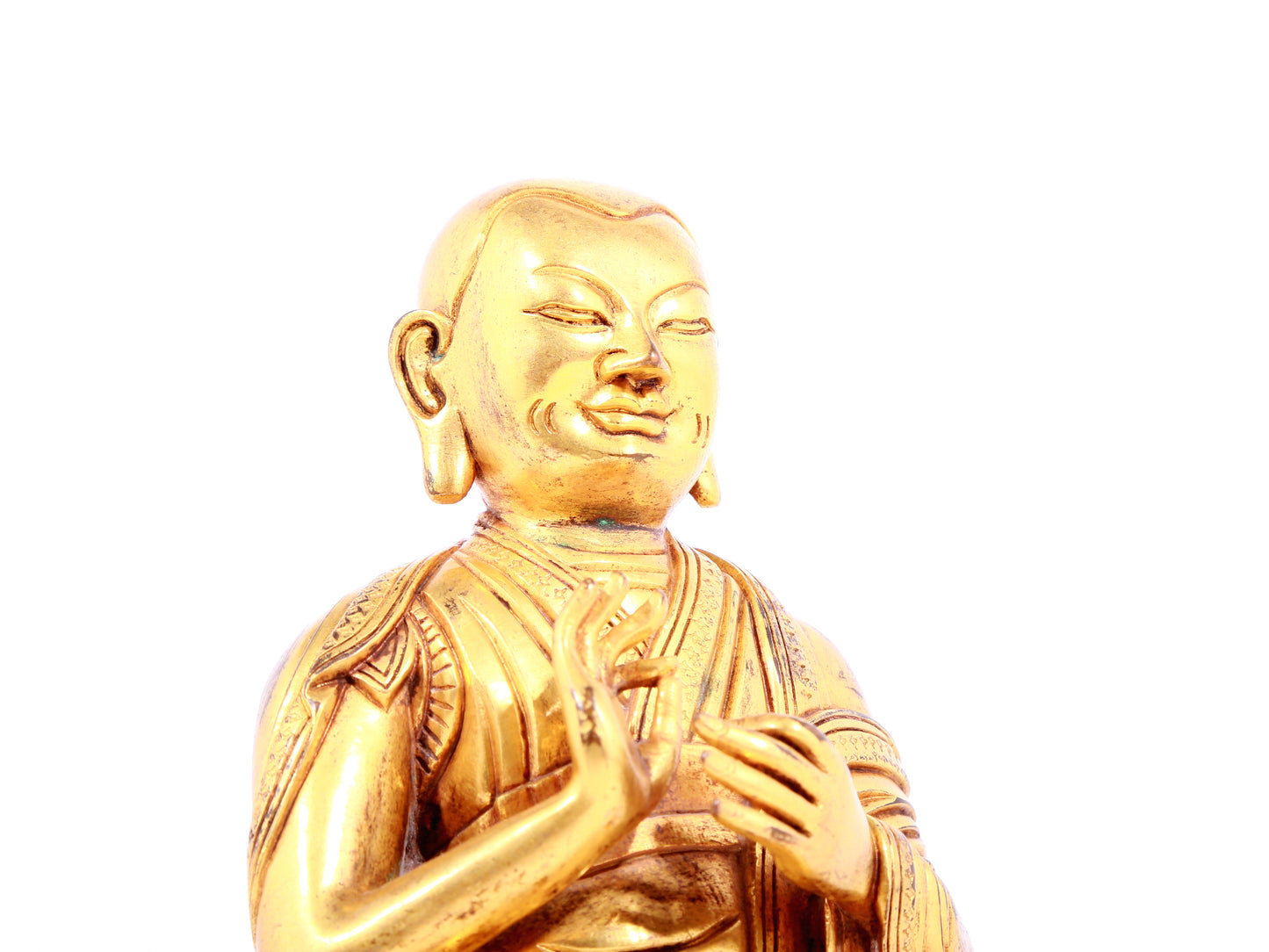 A solemn gilt bronze statue of guru