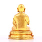 A solemn gilt bronze statue of guru