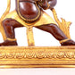 A solemn gilt bronze Vajra statue