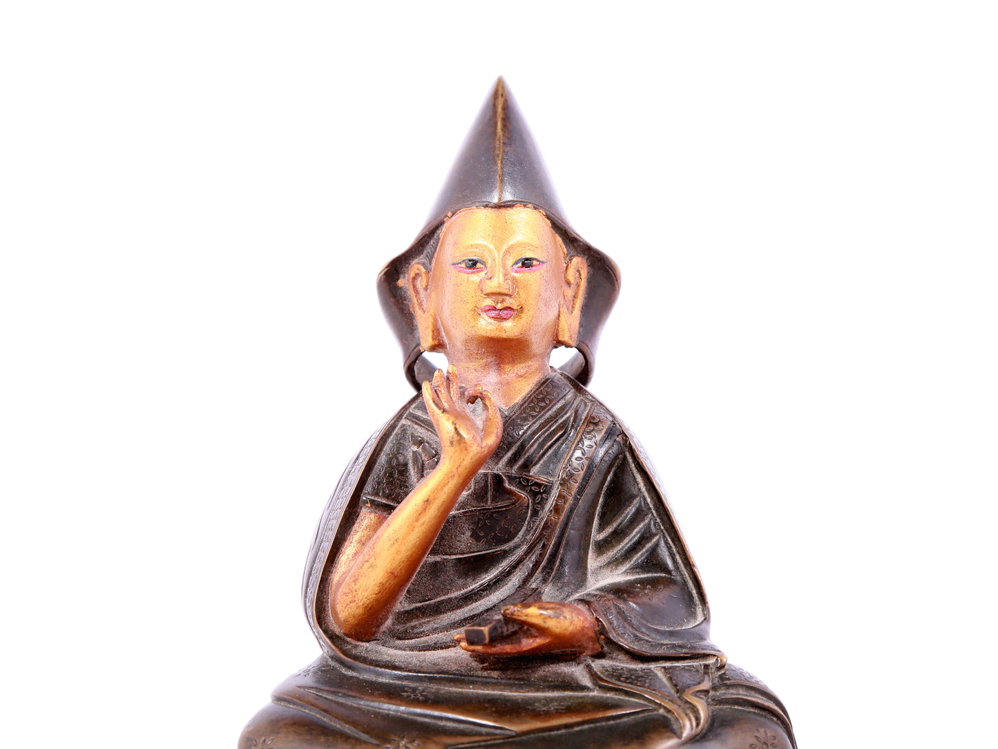 A solemn gilt bronze statue of guru