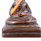 A solemn gilt bronze statue of guru