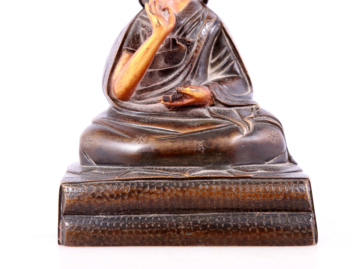 A solemn gilt bronze statue of guru