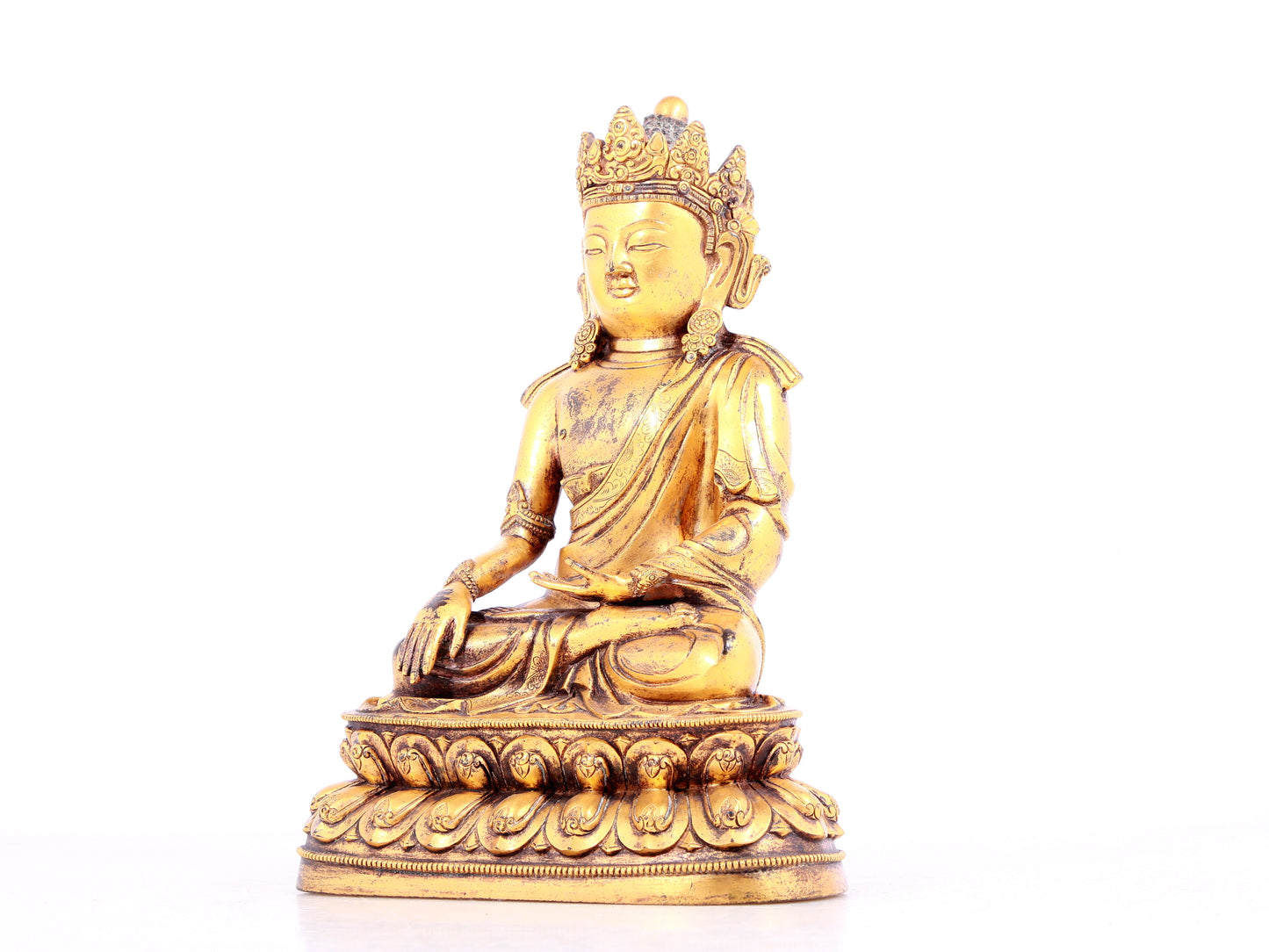 A solemn gilt bronze statue of Bodhisattva