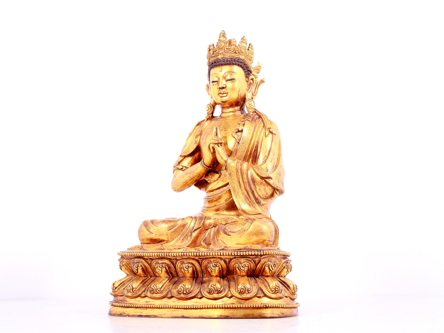 A solemn gilt bronze statue of Bodhisattva