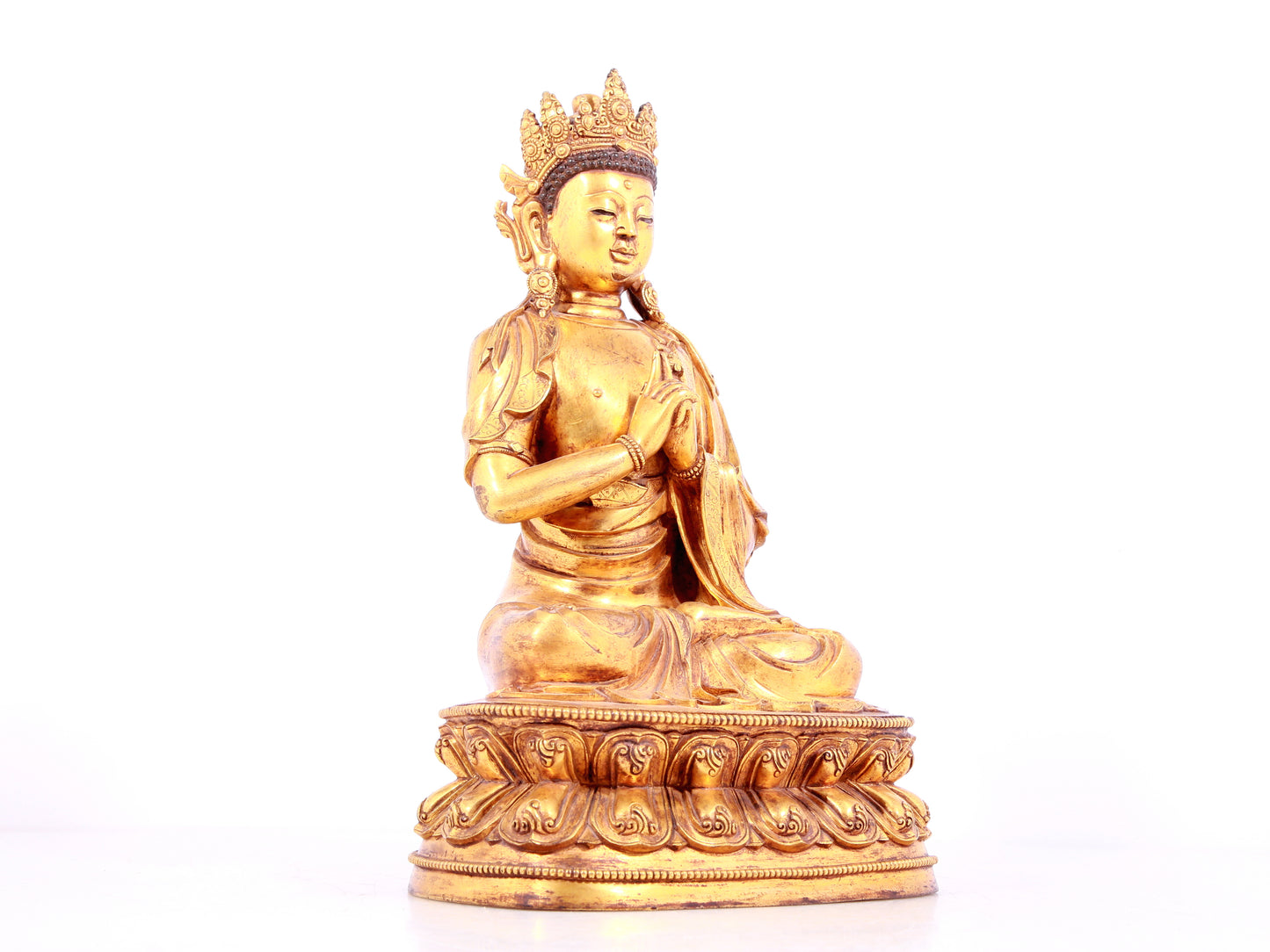 A solemn gilt bronze statue of Bodhisattva