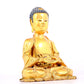 A solemn gilt bronze statue of Sakyamuni