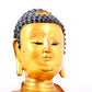 A solemn gilt bronze statue of Sakyamuni