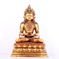 A solemn gilt bronze statue of Amitayus Buddha